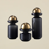 Black Glass Vessels with Brass Orbs